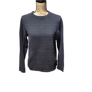 Lululemon black pullover sweater with front zippers and long sleeves, size 6